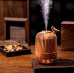 بخور سرد درخت و پرنده روی میز اتاق خواب