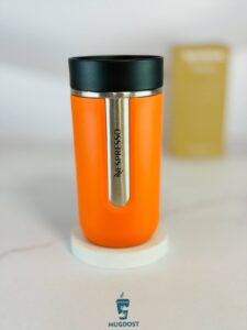 نمای کلی تراول ماگ نسپرسو نارنجی Nespresso nomad با بدنه استیل و طراحی شیک سوئیسی