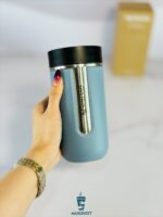 نمای کلی تراول ماگ نسپرسو آبی اقیانوسی Nespresso nomad با بدنه استیل و طراحی شیک سوئیسی